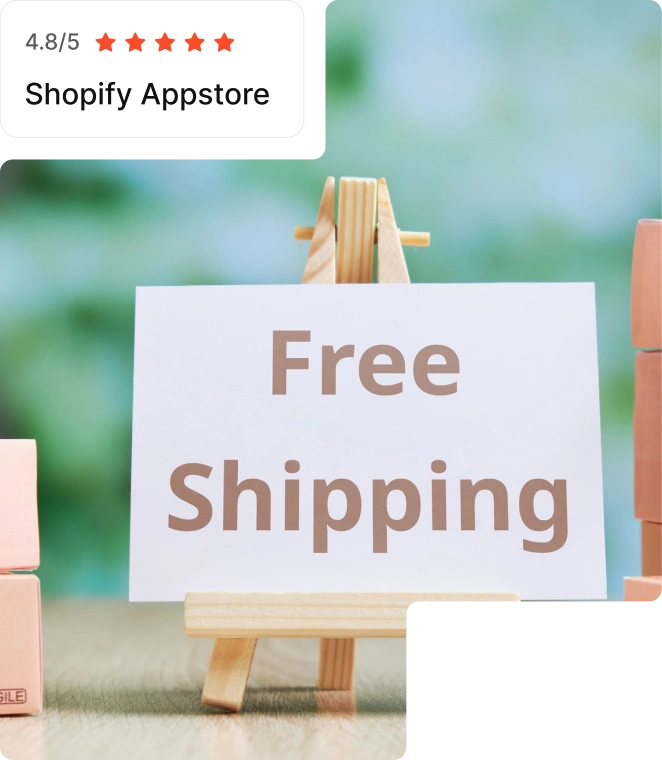 Free Shipping sign on a blurred green background.